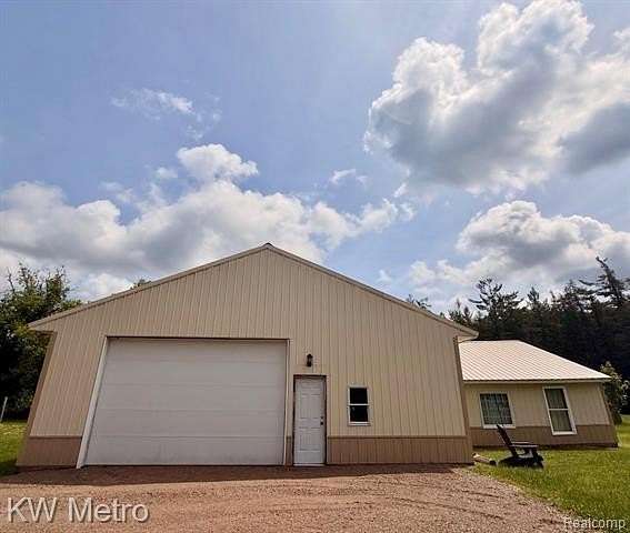 14.7 Acres of Recreational Land with Home for Sale in Tuscarora Township, Michigan