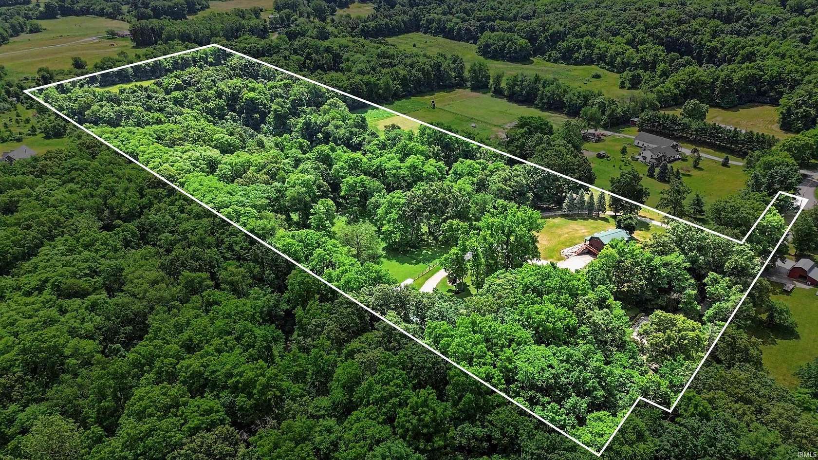 20.3 Acres of Land with Home for Sale in Middlebury, Indiana