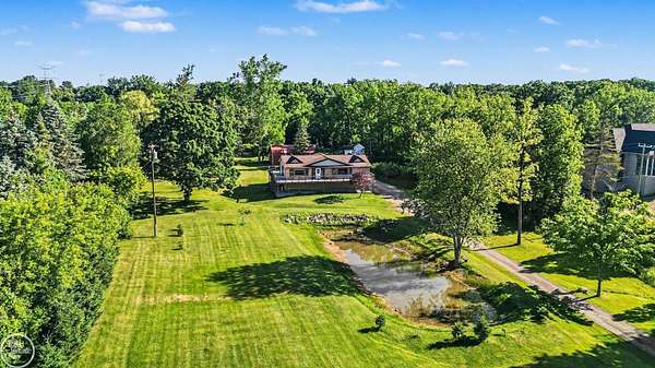 3.1 Acres of Land with Home for Sale in Leonard, Michigan