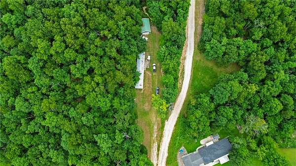 5 Acres of Land with Home for Sale in Rogers, Arkansas