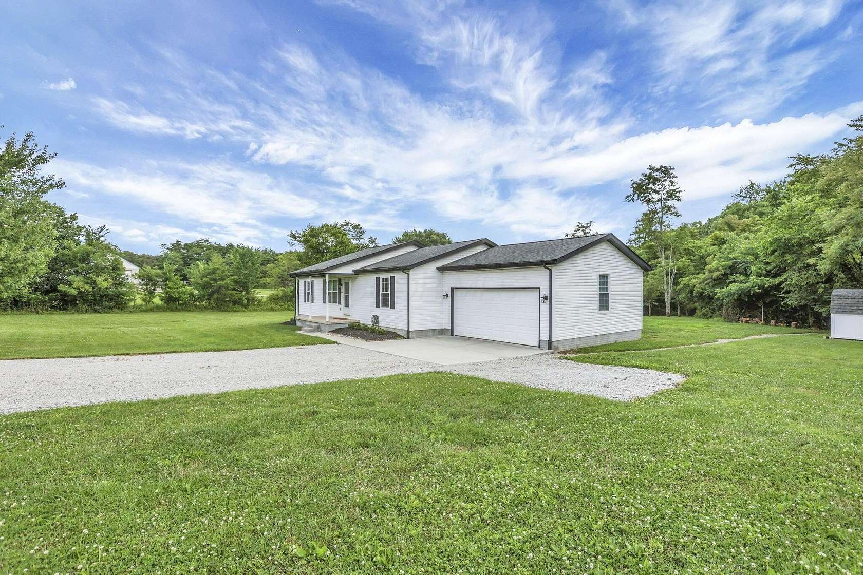 4.87 Acres of Land with Home for Sale in Logan, Ohio