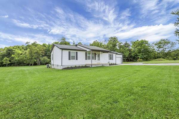 4.87 Acres of Land with Home for Sale in Logan, Ohio