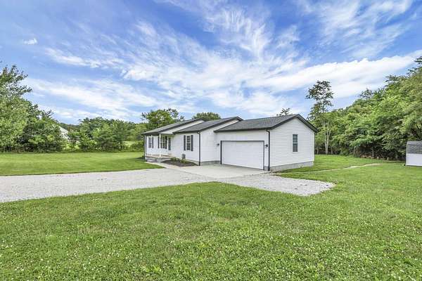 4.87 Acres of Land with Home for Sale in Logan, Ohio