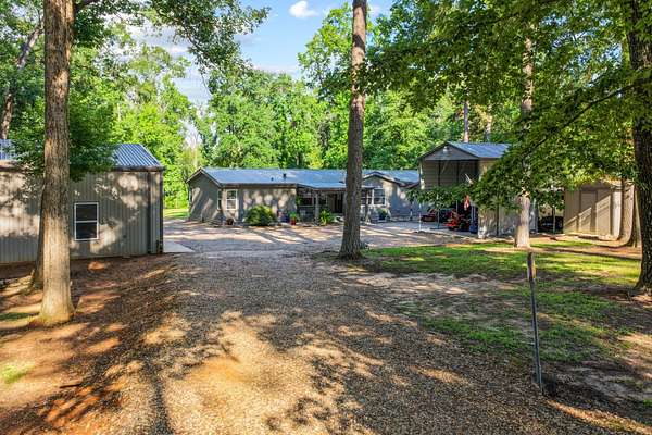 1.6 Acres of Land with Home for Sale in Avinger, Texas