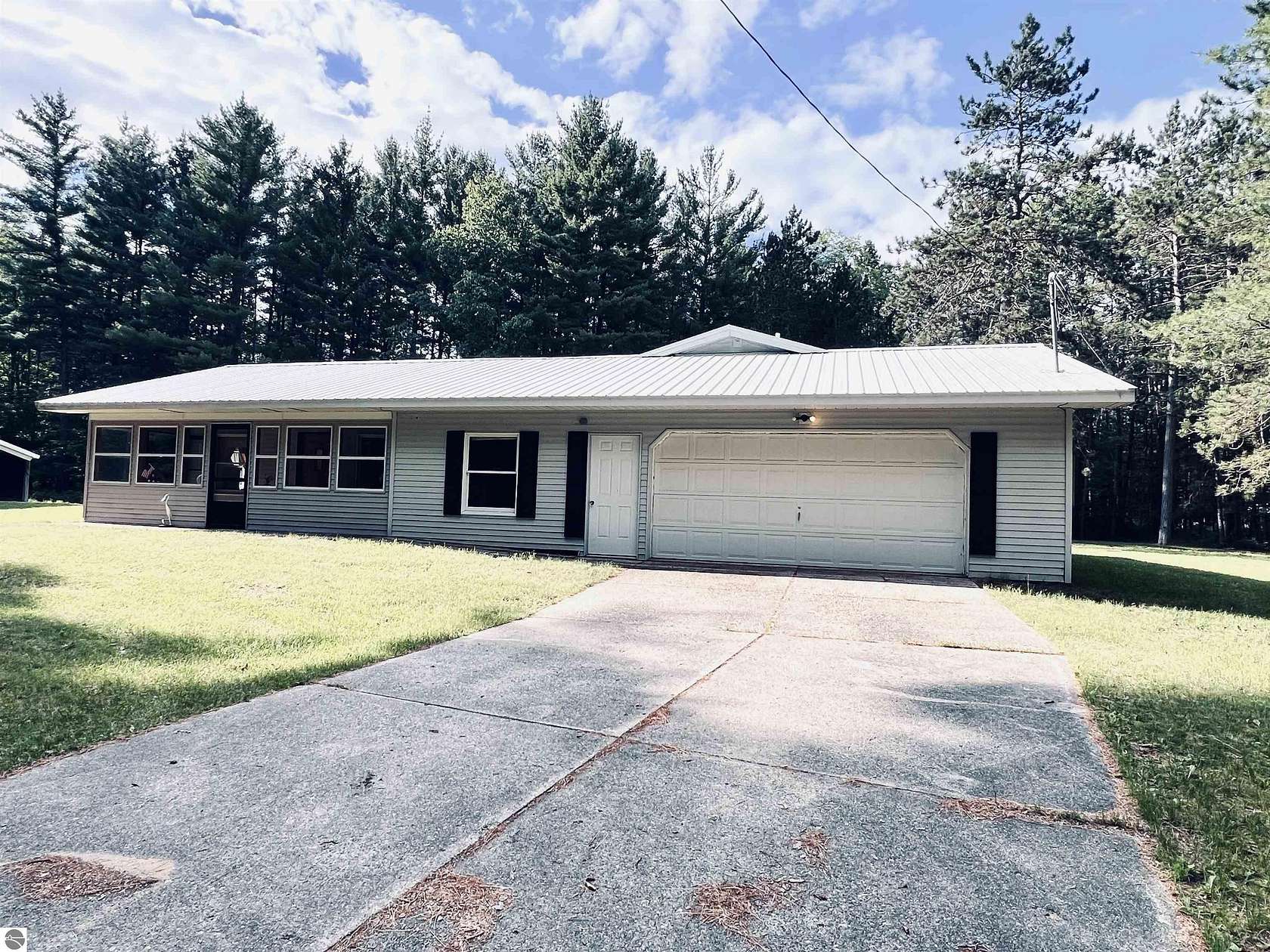 5 Acres of Land with Home for Sale in Lake City, Michigan