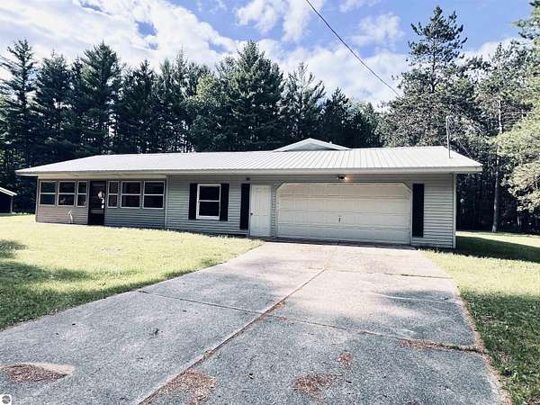 5 Acres of Land with Home for Sale in Lake City, Michigan