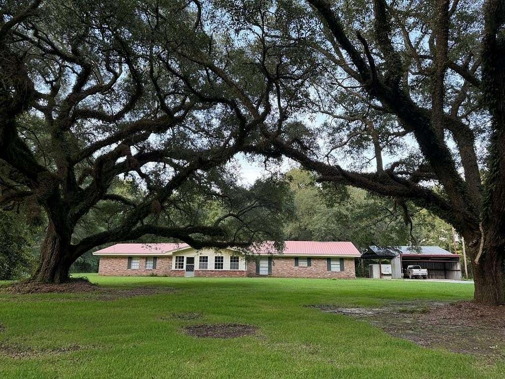 5 Acres of Land with Home for Sale in Moselle, Mississippi