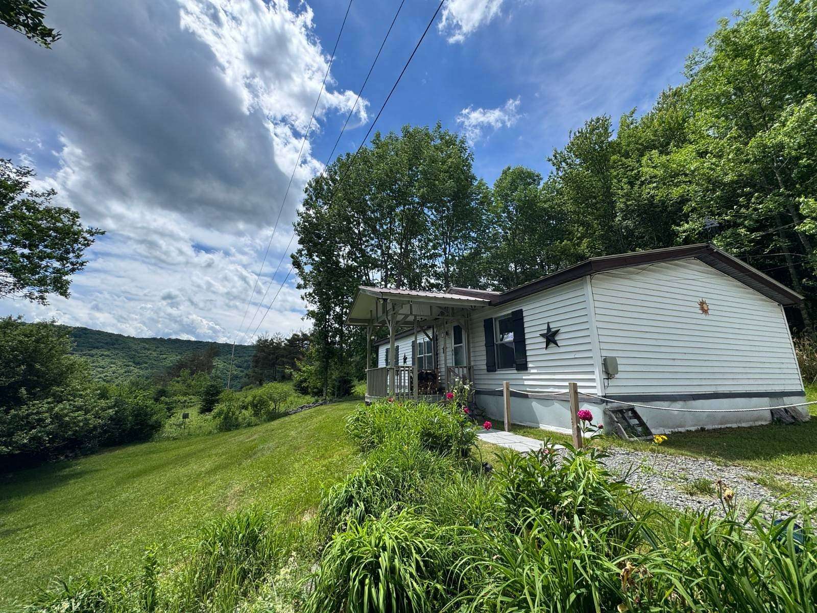 2.8 Acres of Land with Home for Sale in Delhi, New York