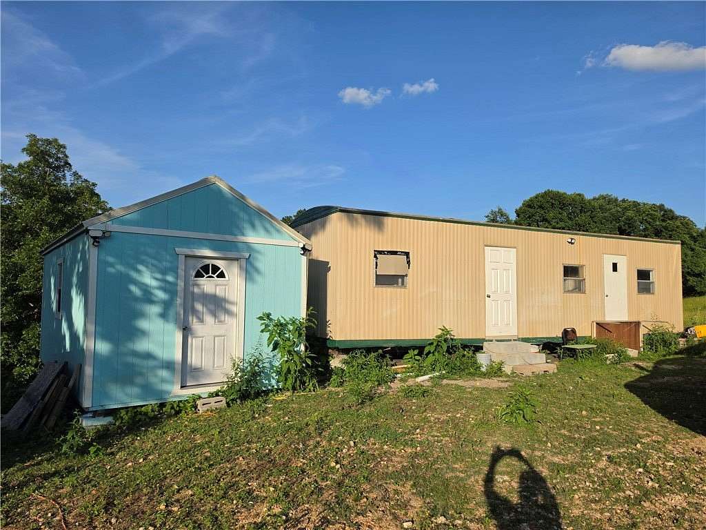 5.12 Acres of Land for Sale in Lowell, Arkansas