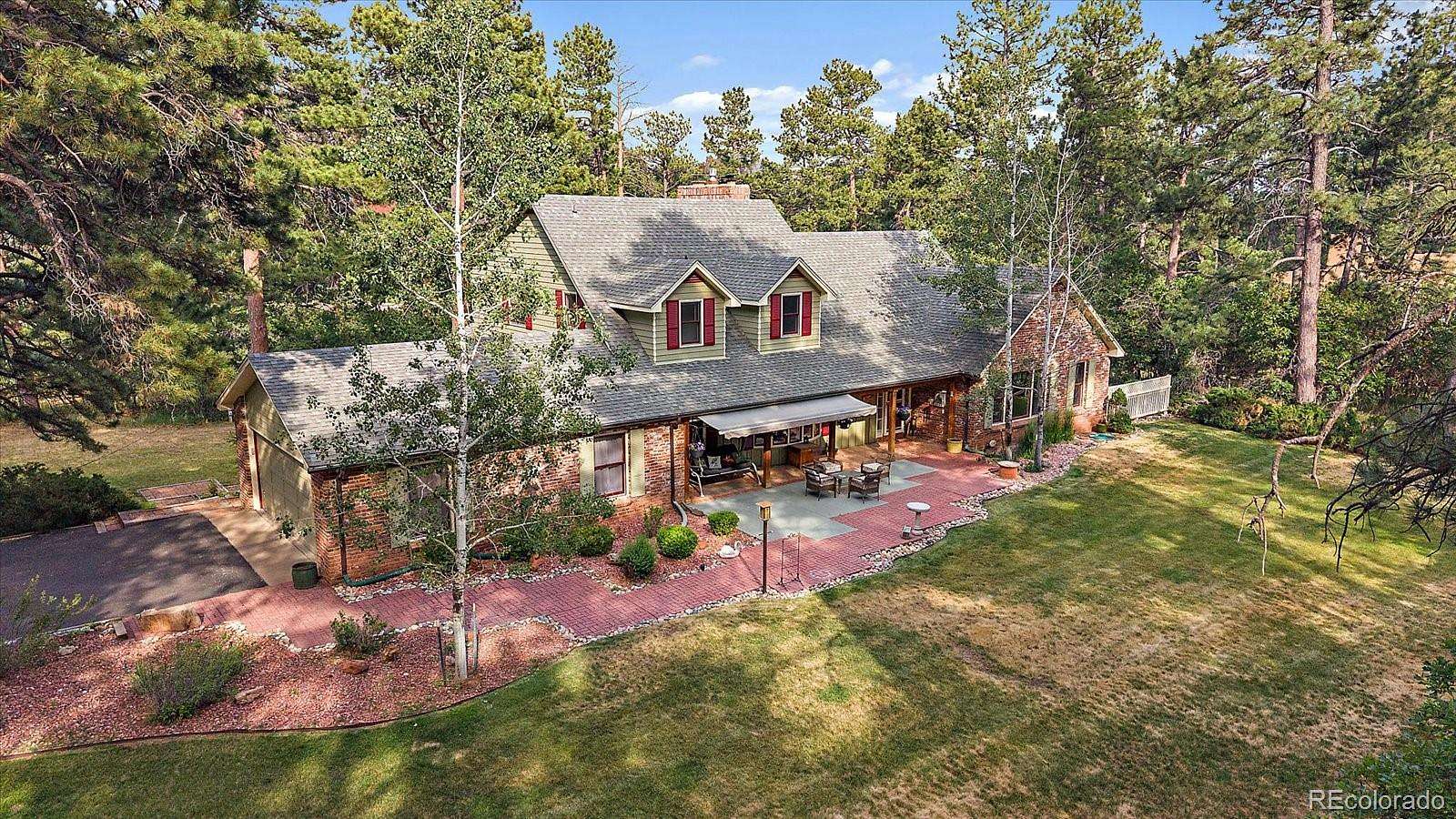 2.57 Acres of Land with Home for Sale in Larkspur, Colorado