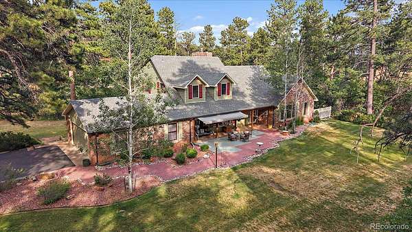 2.57 Acres of Land with Home for Sale in Larkspur, Colorado