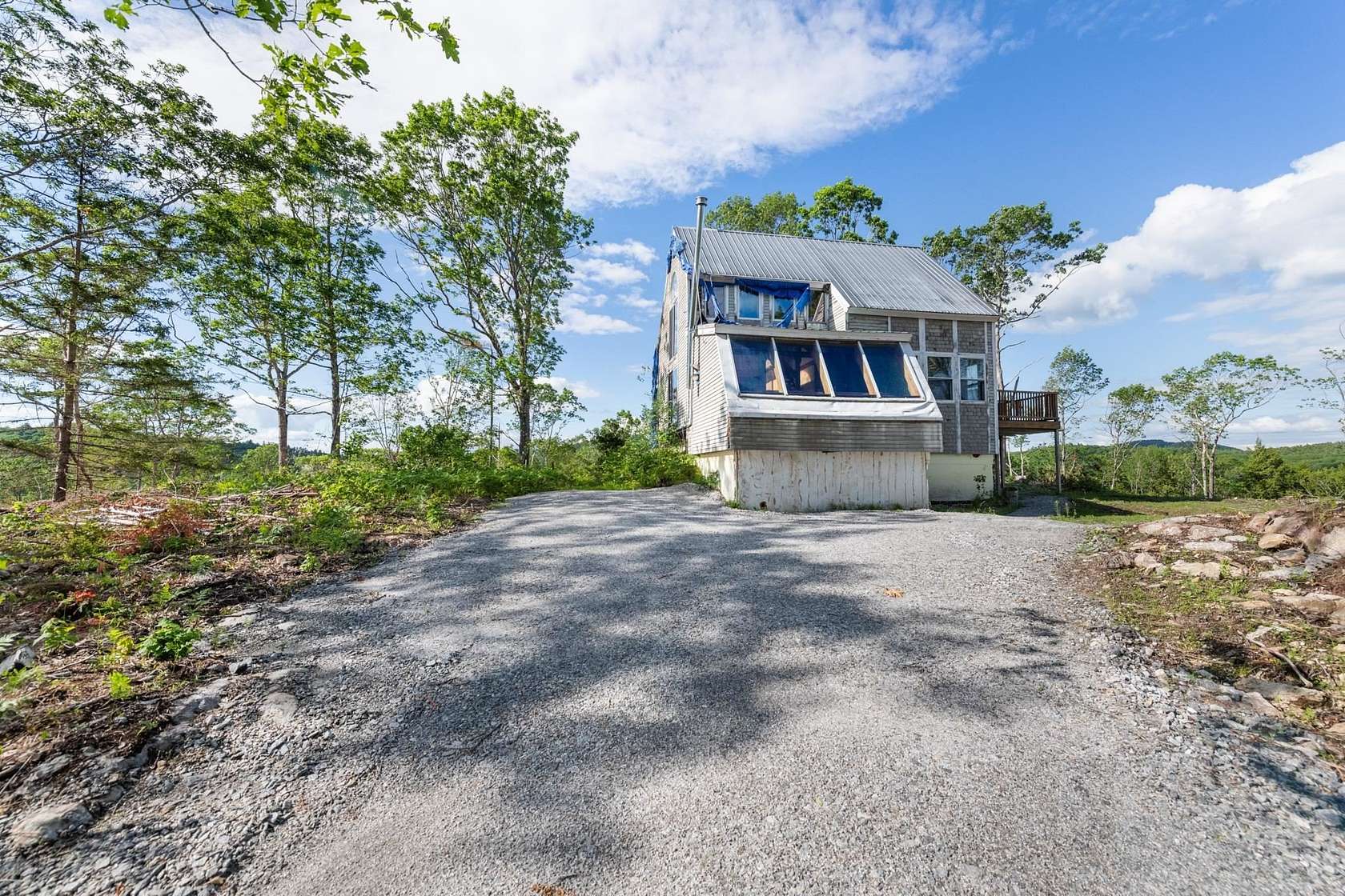 23.9 Acres of Land with Home for Sale in Holderness, New Hampshire