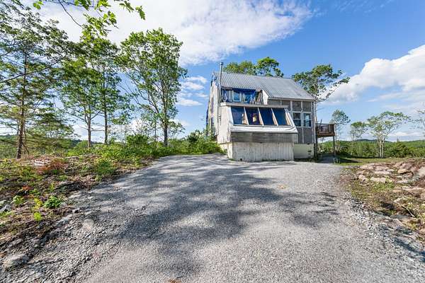 23.9 Acres of Land with Home for Sale in Holderness, New Hampshire