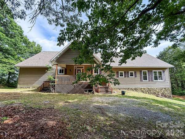 1.76 Acres of Land with Home for Auction in Columbus, North Carolina