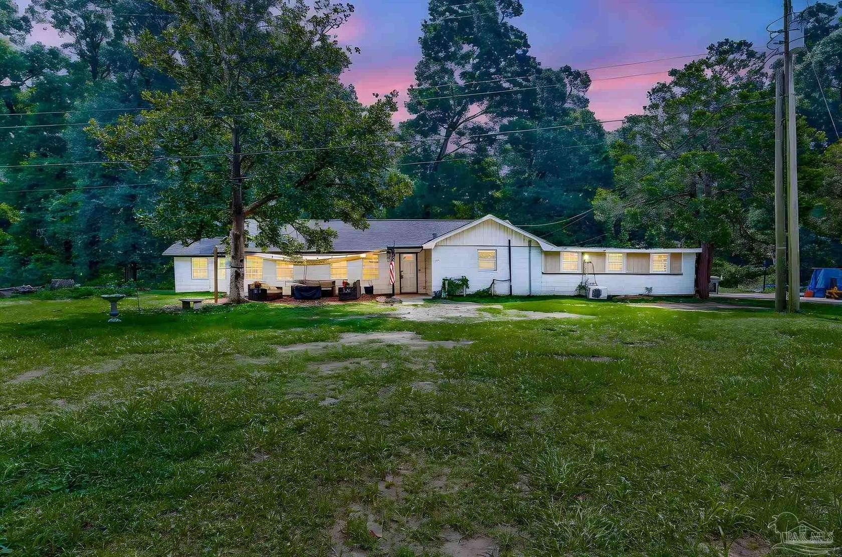 2.12 Acres of Land with Home for Sale in Pace, Florida