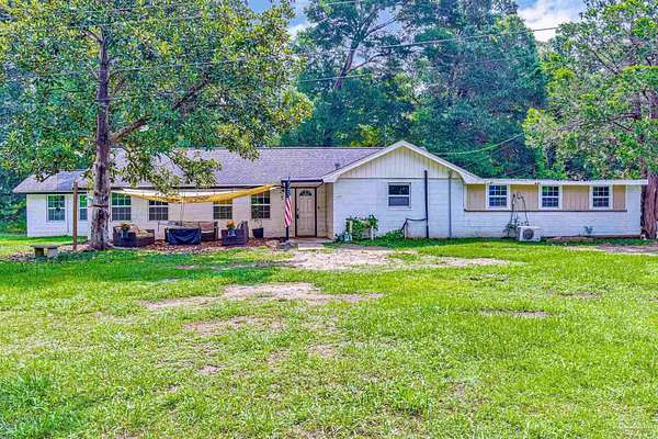 2.12 Acres of Land with Home for Sale in Pace, Florida