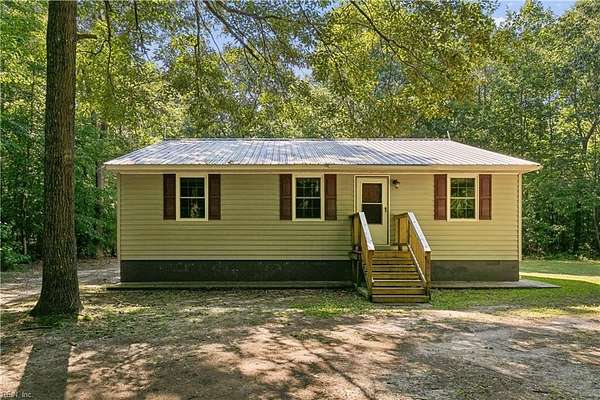 5.24 Acres of Land with Home for Sale in Hayes, Virginia