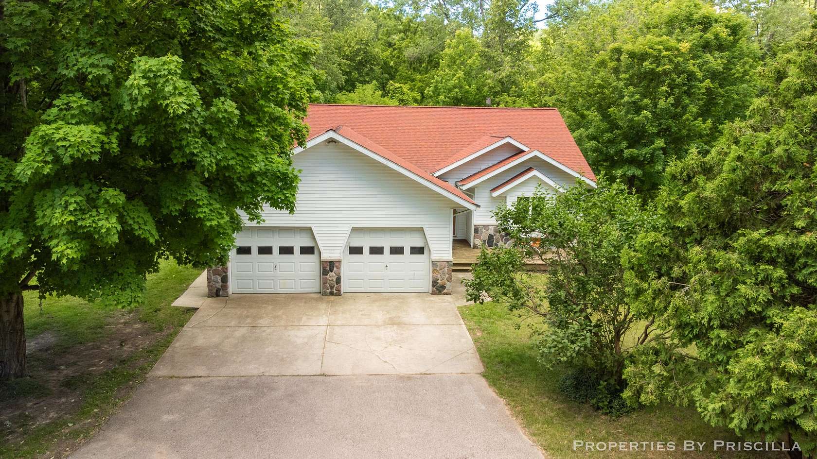 6 Acres of Land with Home for Sale in Comstock Park, Michigan