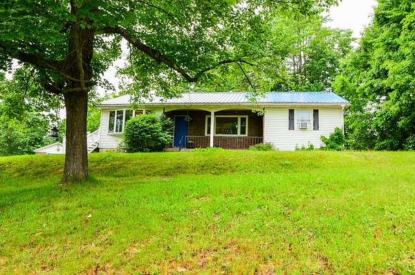 4 Acres of Land with Home for Sale in Leeds, Maine