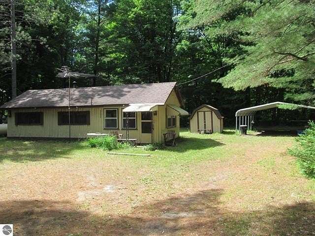 0.62 Acres of Land with Home for Sale in Mesick, Michigan