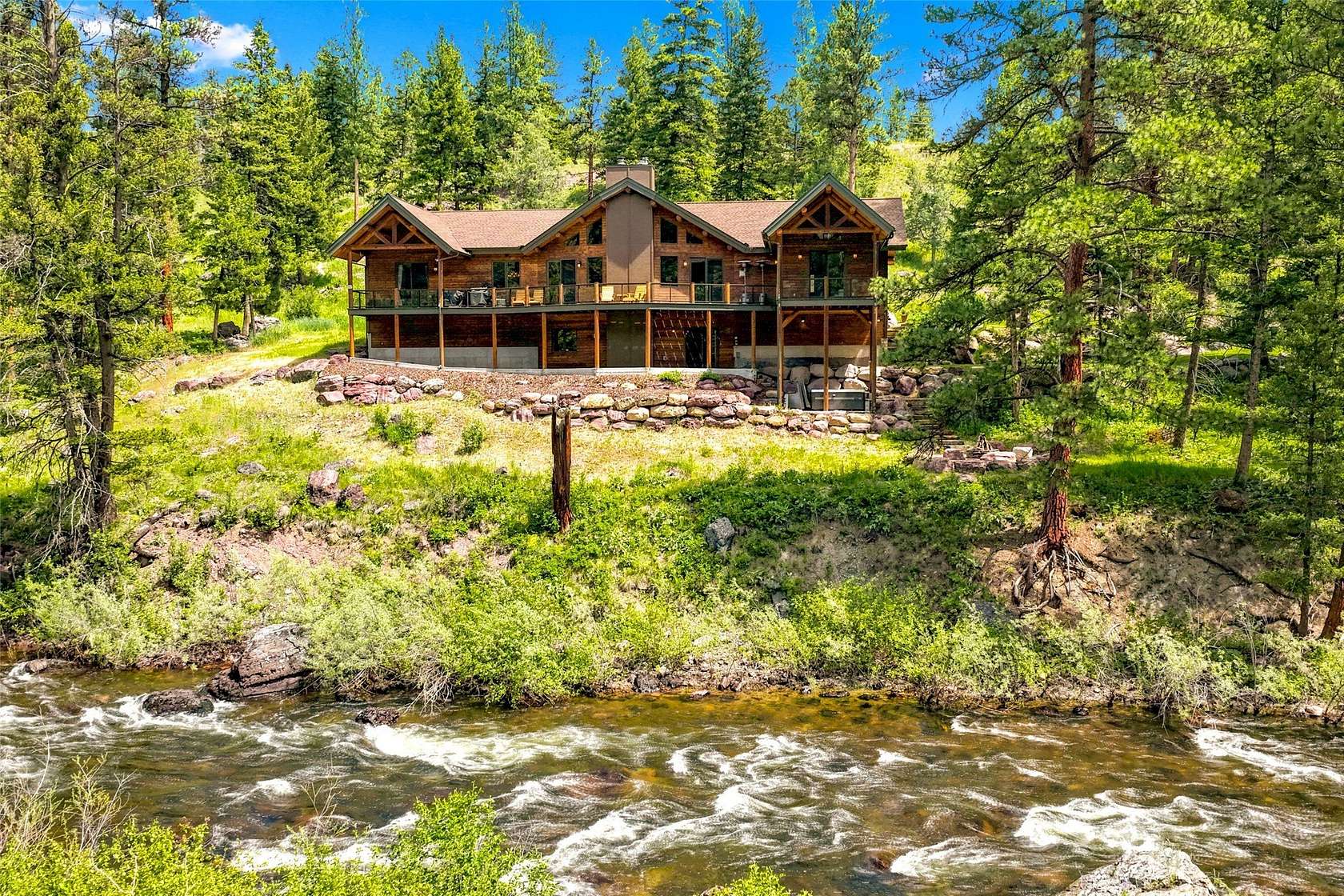 4.83 Acres of Land with Home for Sale in Seeley Lake, Montana