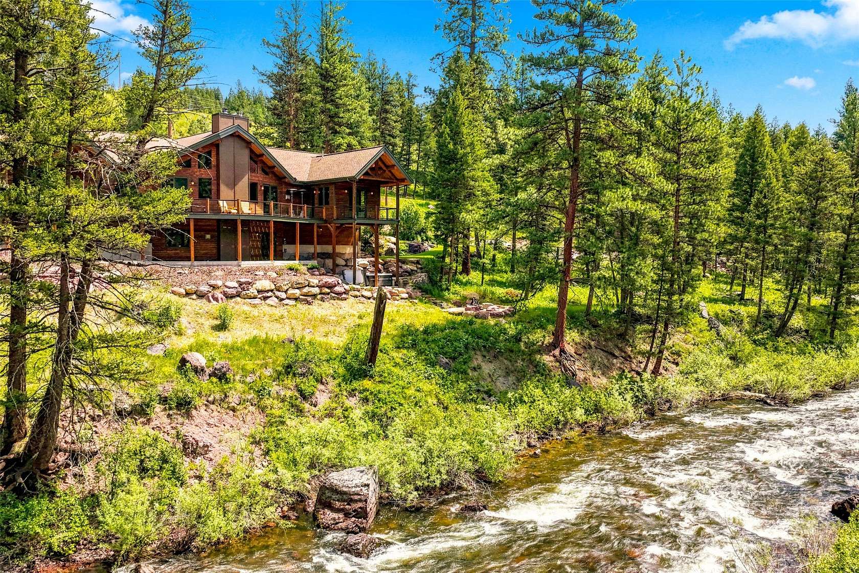 4.83 Acres of Land with Home for Sale in Seeley Lake, Montana