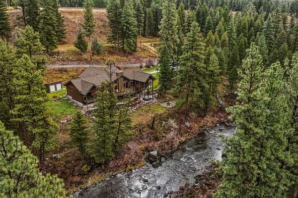 4.83 Acres of Land with Home for Sale in Seeley Lake, Montana