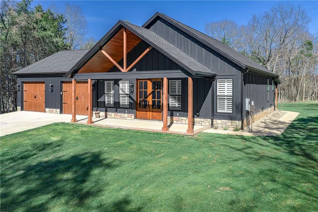 11 Acres of Land with Home for Sale in Fayetteville, Arkansas