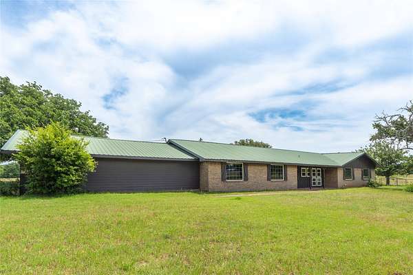 44.5 Acres of Agricultural Land with Home for Sale in Nocona, Texas