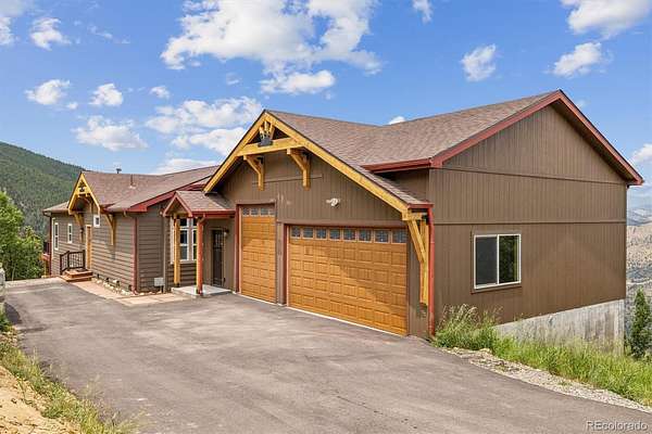 5.44 Acres of Land with Home for Sale in Evergreen, Colorado