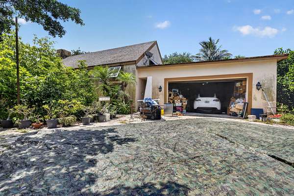 5 Acres of Land with Home for Sale in Lake Worth Beach, Florida