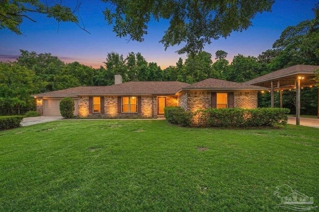 1.52 Acres of Land with Home for Sale in Milton, Florida