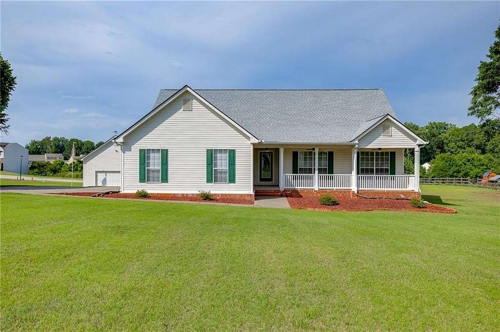 1.5 Acres of Land with Home for Sale in Hoschton, Georgia