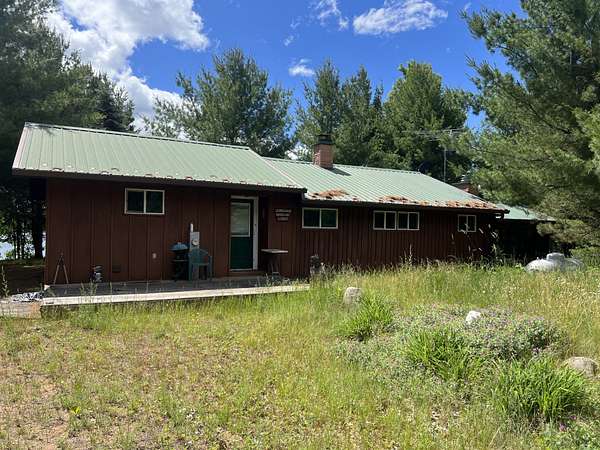 24.4 Acres of Recreational Land with Home for Sale in Webster, Wisconsin