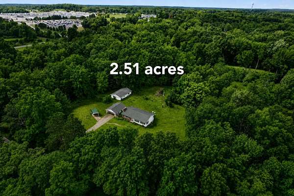2.5 Acres of Land with Home for Sale in Parma, Michigan
