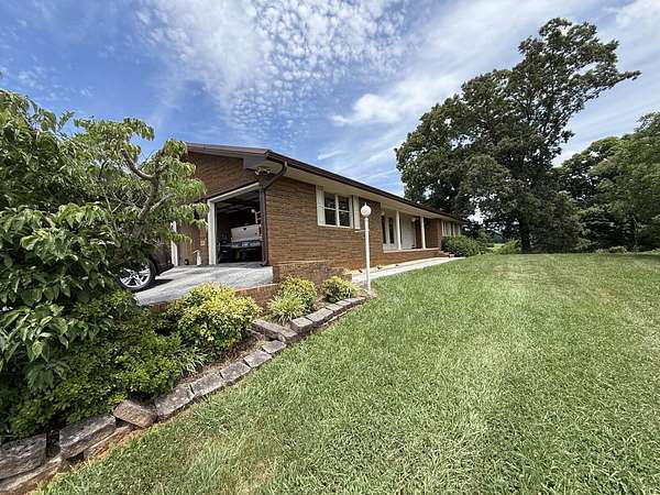 11.2 Acres of Land with Home for Sale in Parrottsville, Tennessee