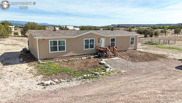 9.25 Acres of Land with Home for Sale in Penrose, Colorado