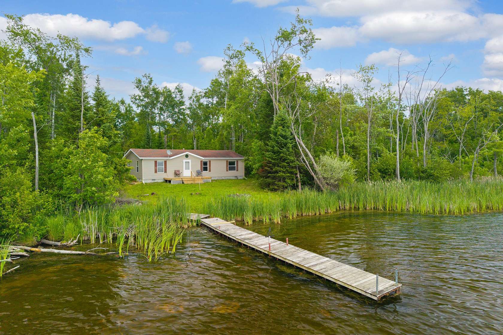 22.6 Acres of Recreational Land with Home for Sale in Lachine, Michigan