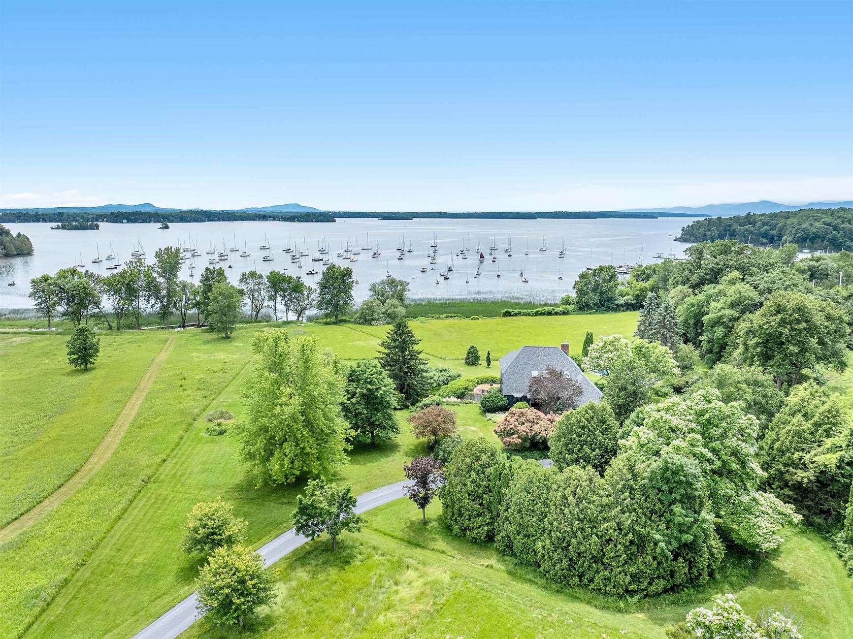5.43 Acres of Land with Home for Sale in Charlotte, Vermont