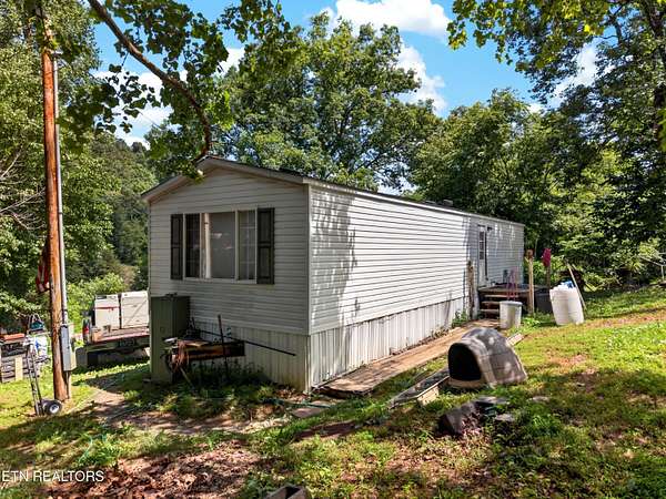 12.5 Acres of Land with Home for Sale in Thorn Hill, Tennessee