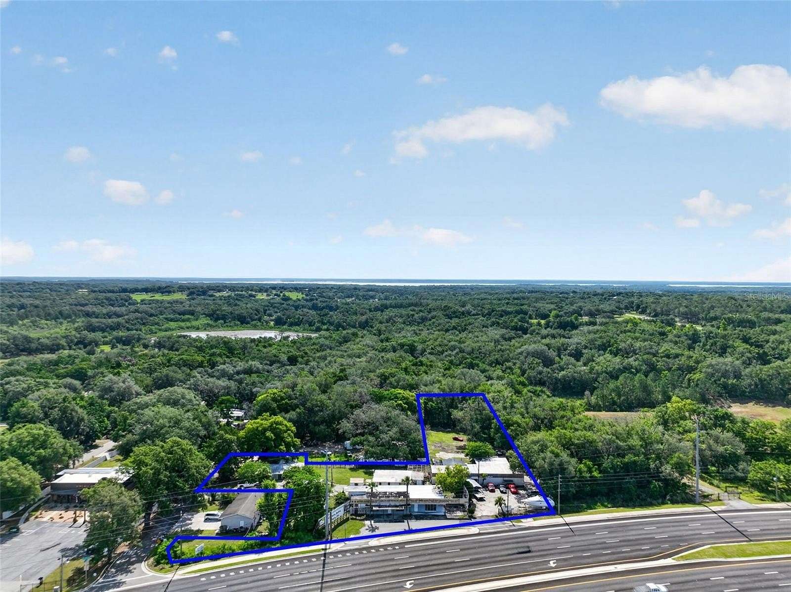 1.55 Acres of Improved Mixed-Use Land for Sale in Lady Lake, Florida