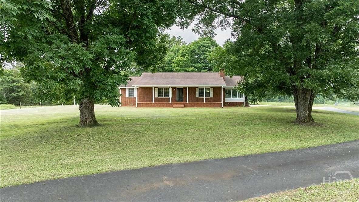 11.5 Acres of Land with Home for Sale in Winterville, Georgia