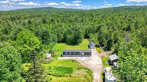 50 Acres of Recreational Land with Home for Sale in New Sharon, Maine