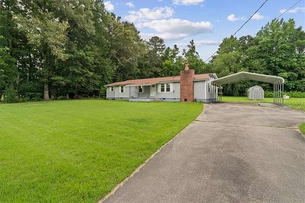 10.5 Acres of Land with Home for Sale in Sugar Valley, Georgia