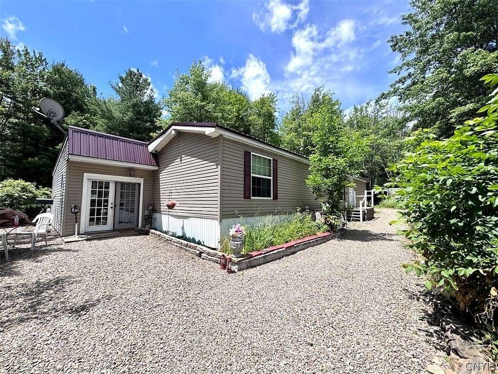 12.2 Acres of Recreational Land with Home for Sale in Friendship, New York