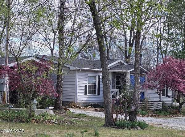 8 Acres of Land with Home for Sale in Carl Junction, Missouri