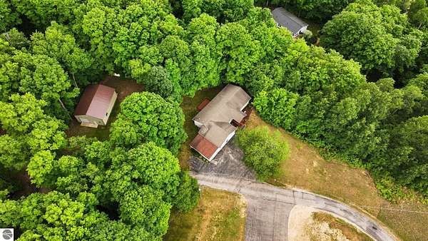 2.3 Acres of Land with Home for Sale in Williamsburg, Michigan