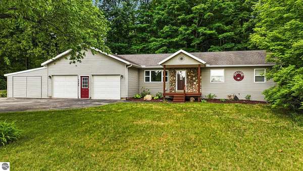 2.3 Acres of Land with Home for Sale in Williamsburg, Michigan