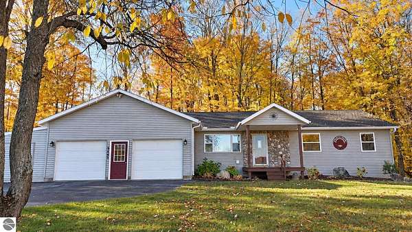 2.3 Acres of Land with Home for Sale in Williamsburg, Michigan