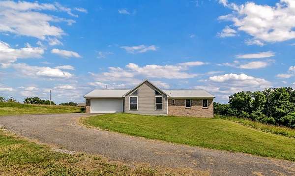 3.8 Acres of Land with Home for Sale in Cadiz, Kentucky